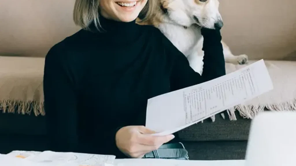 Person reviewing a pet insurance policy document